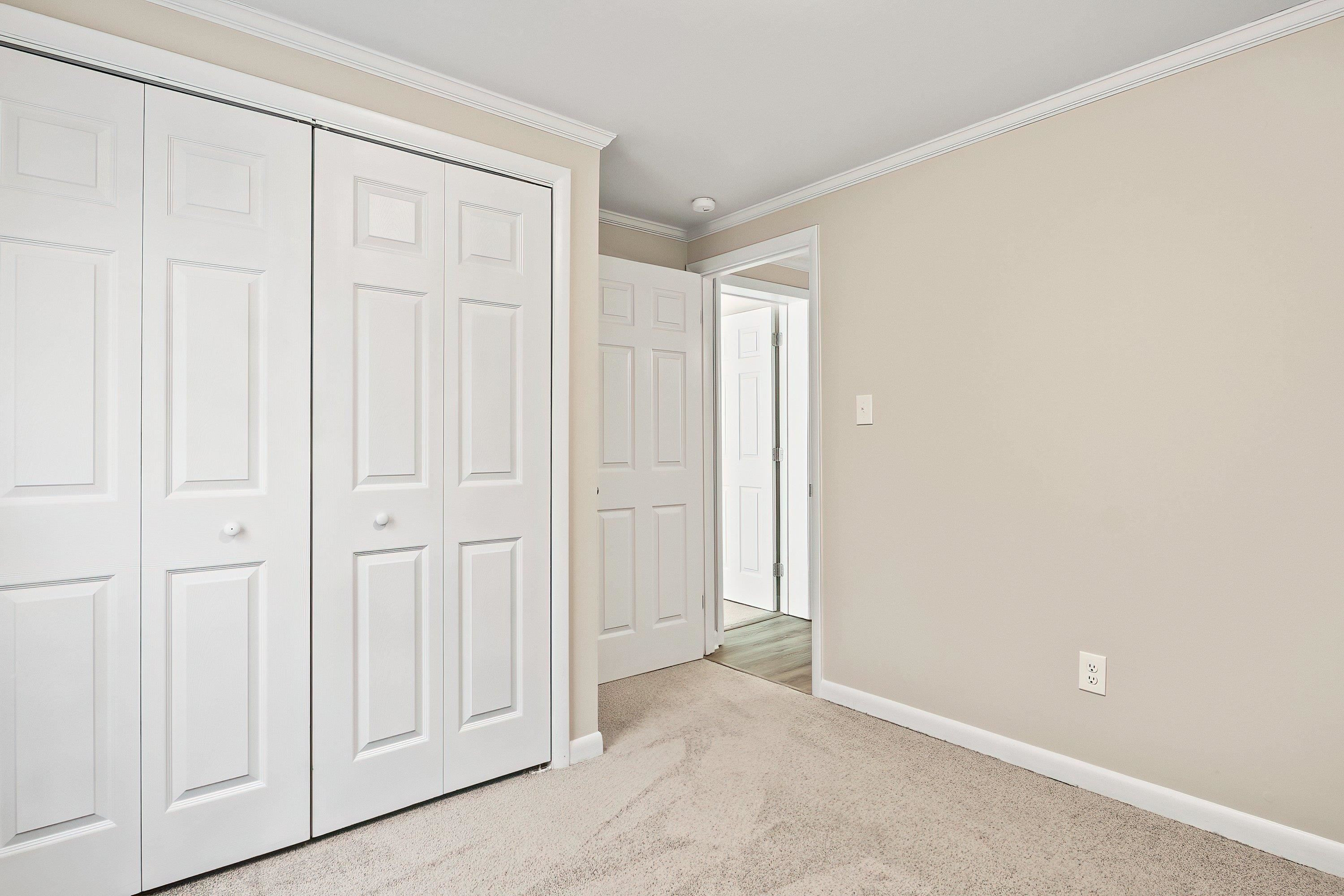 1313 Ewing Drive Garner, NC 27529 - Photo 25 of 46 an empty room with windows