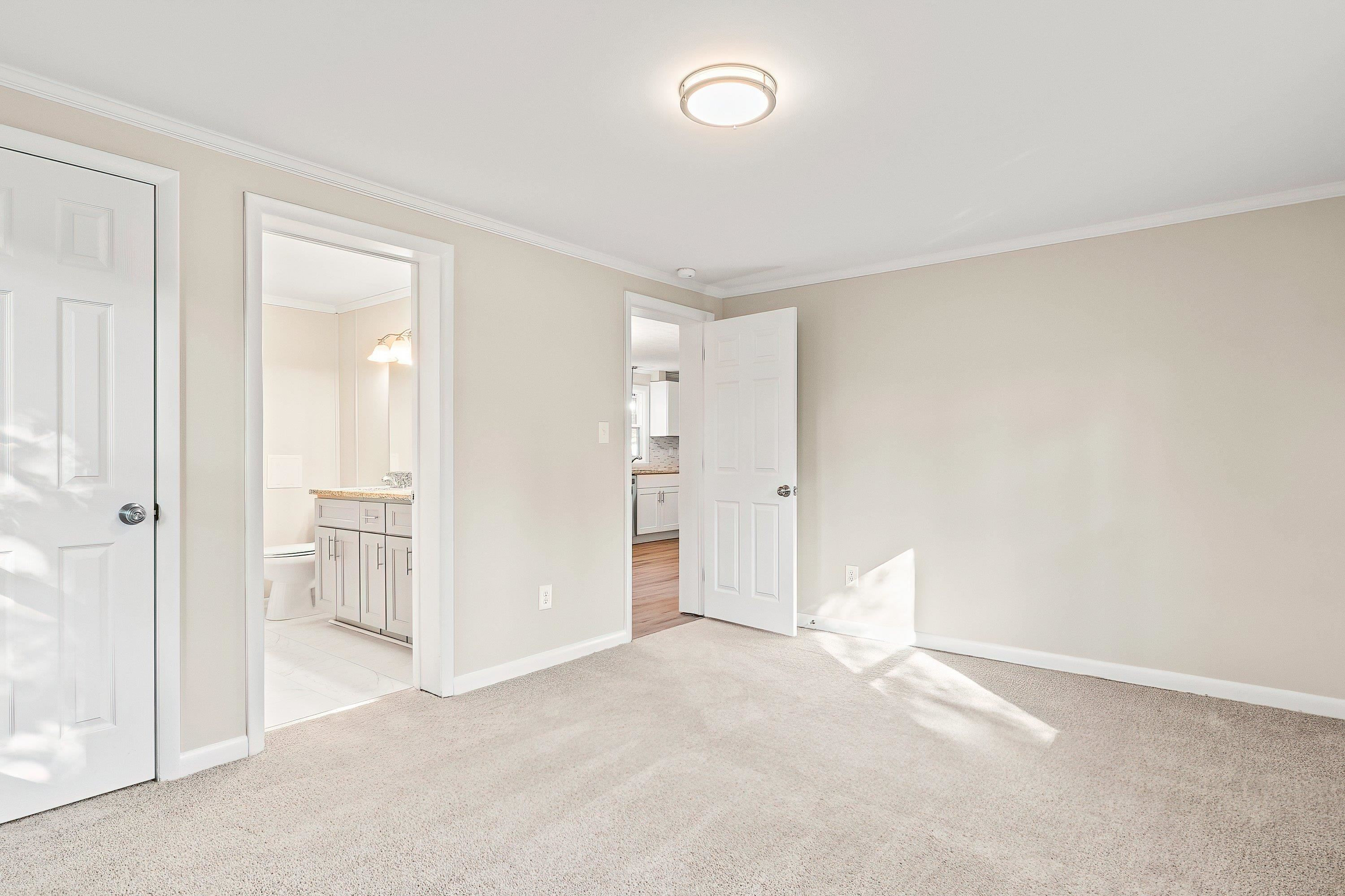 1313 Ewing Drive Garner, NC 27529 - Photo 28 of 46 a view of an empty room