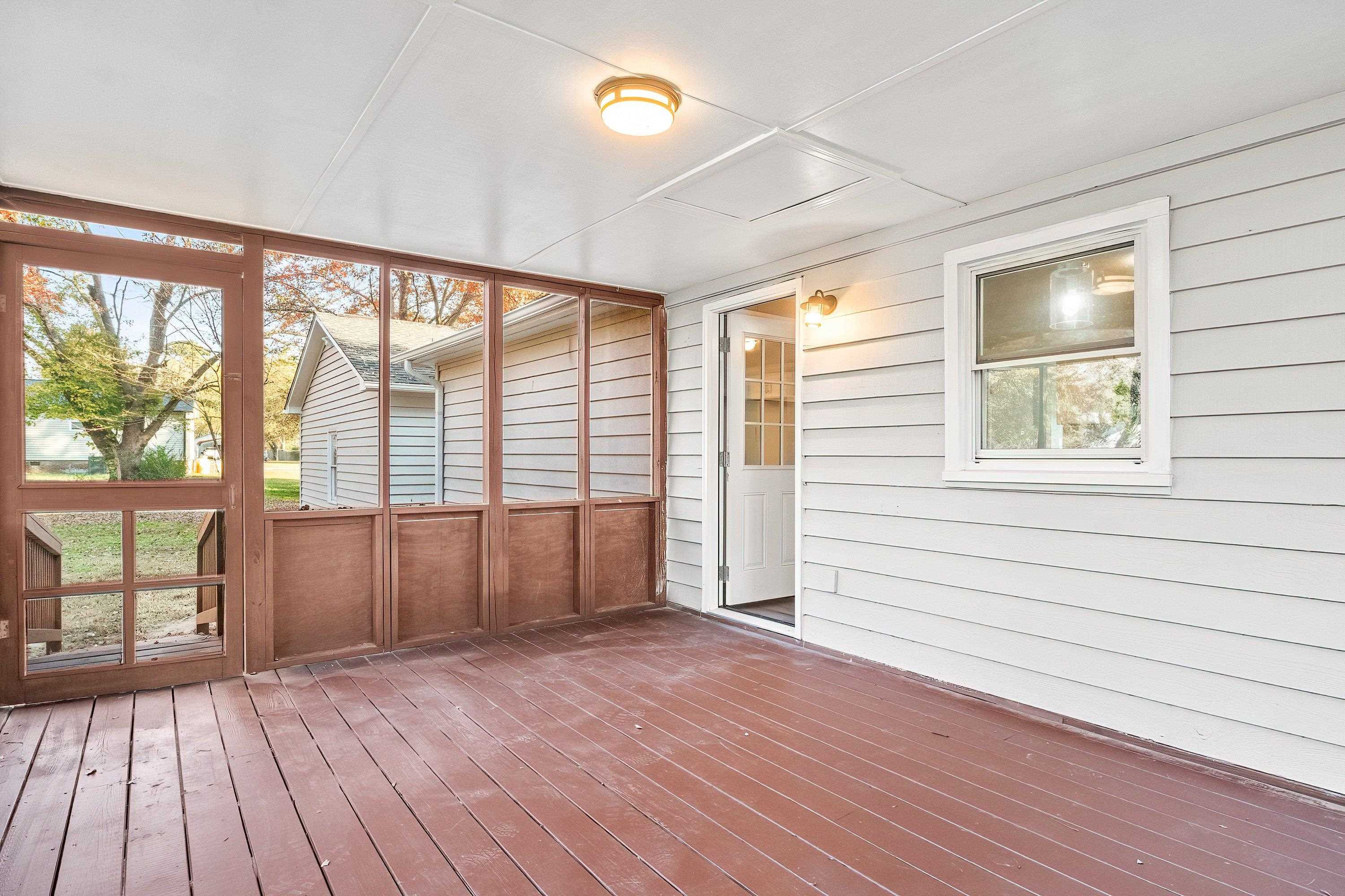 1313 Ewing Drive Garner, NC 27529 - Photo 45 of 46 wooden floor in an empty room with a window