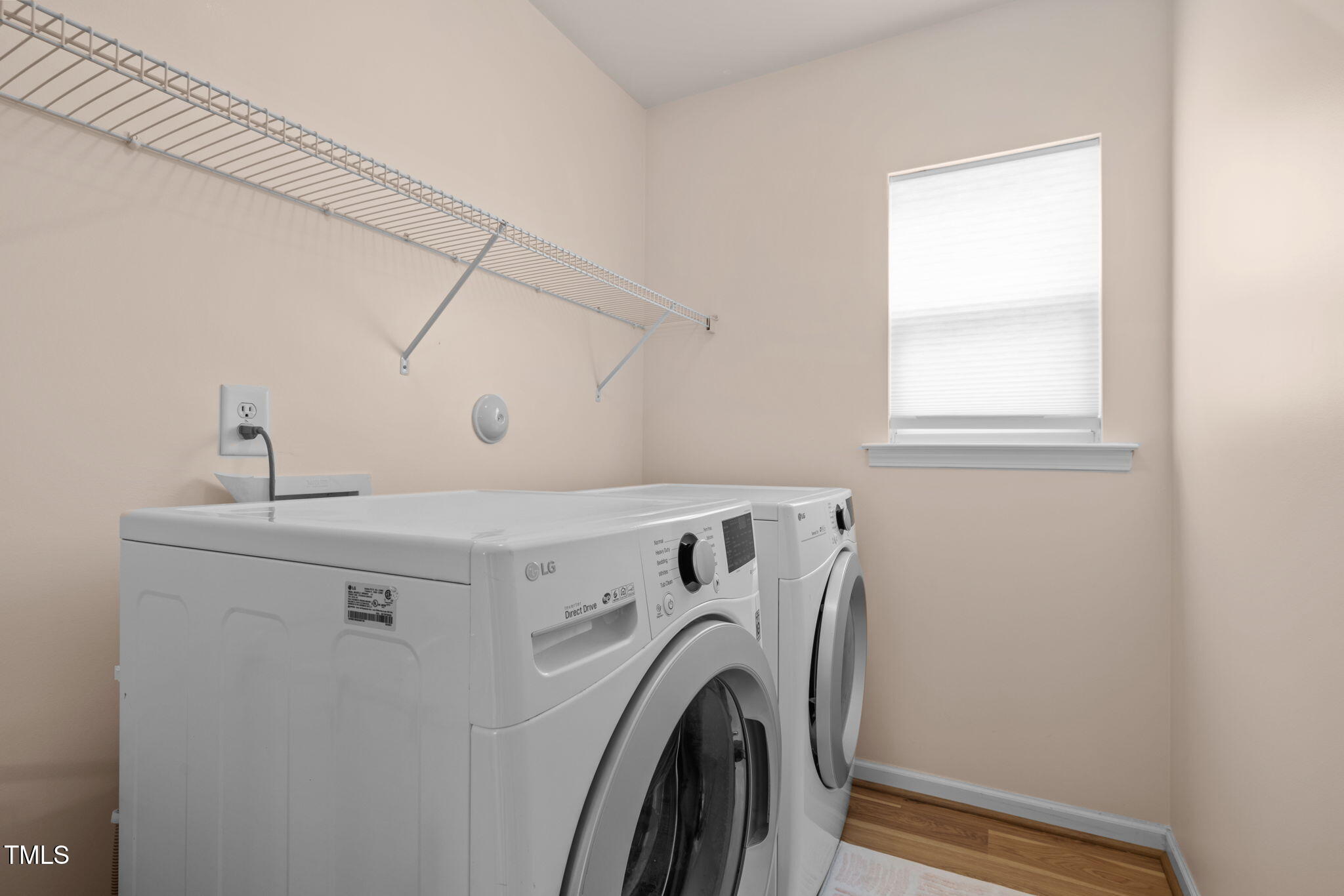 706 Delta Downs Drive Cary, NC 27519 - Photo 28 of 42 a utility room with dryer and washer