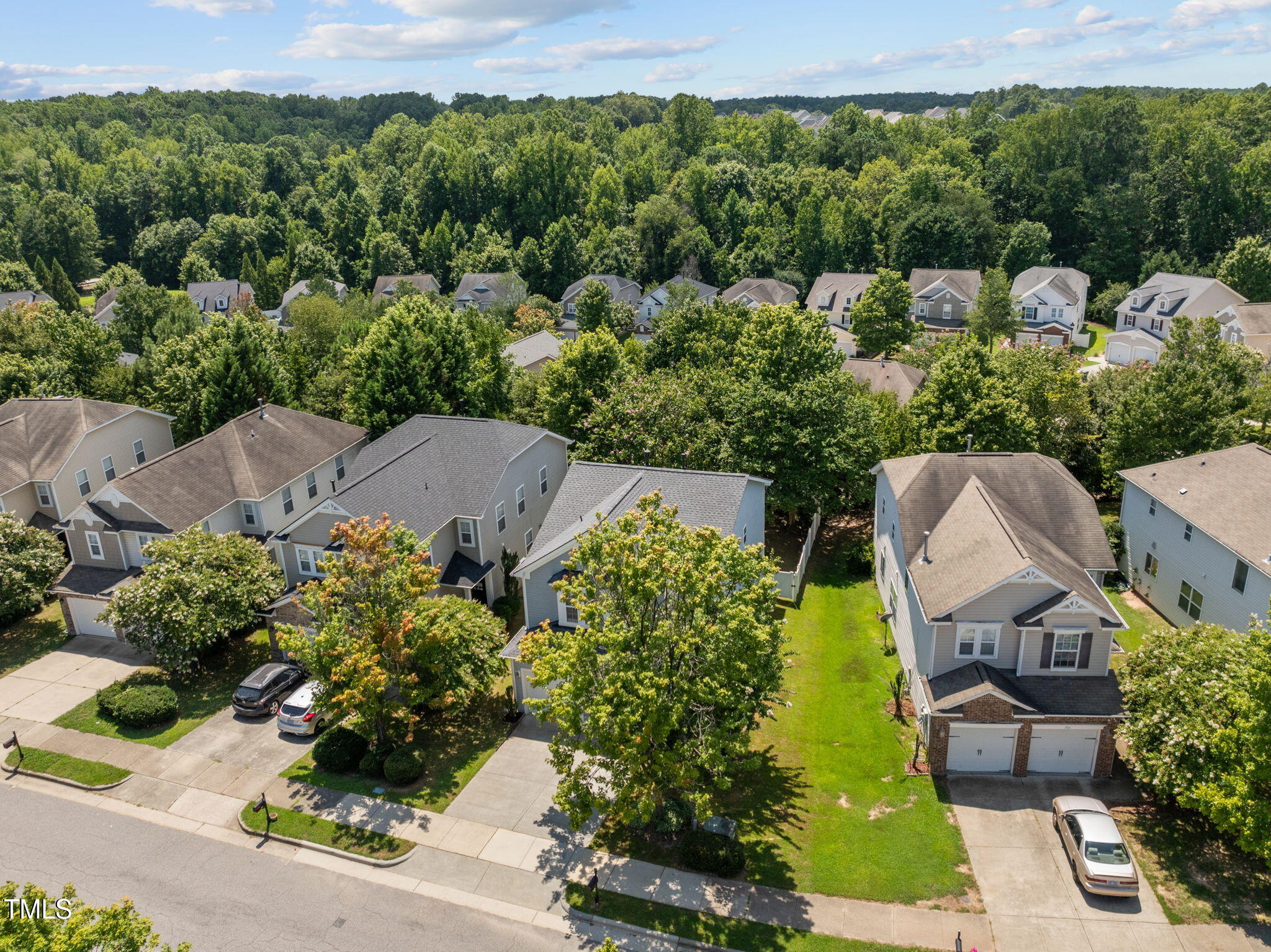 706 Delta Downs Drive Cary, NC 27519 - Photo 37 of 42 an aerial view of a house with yard