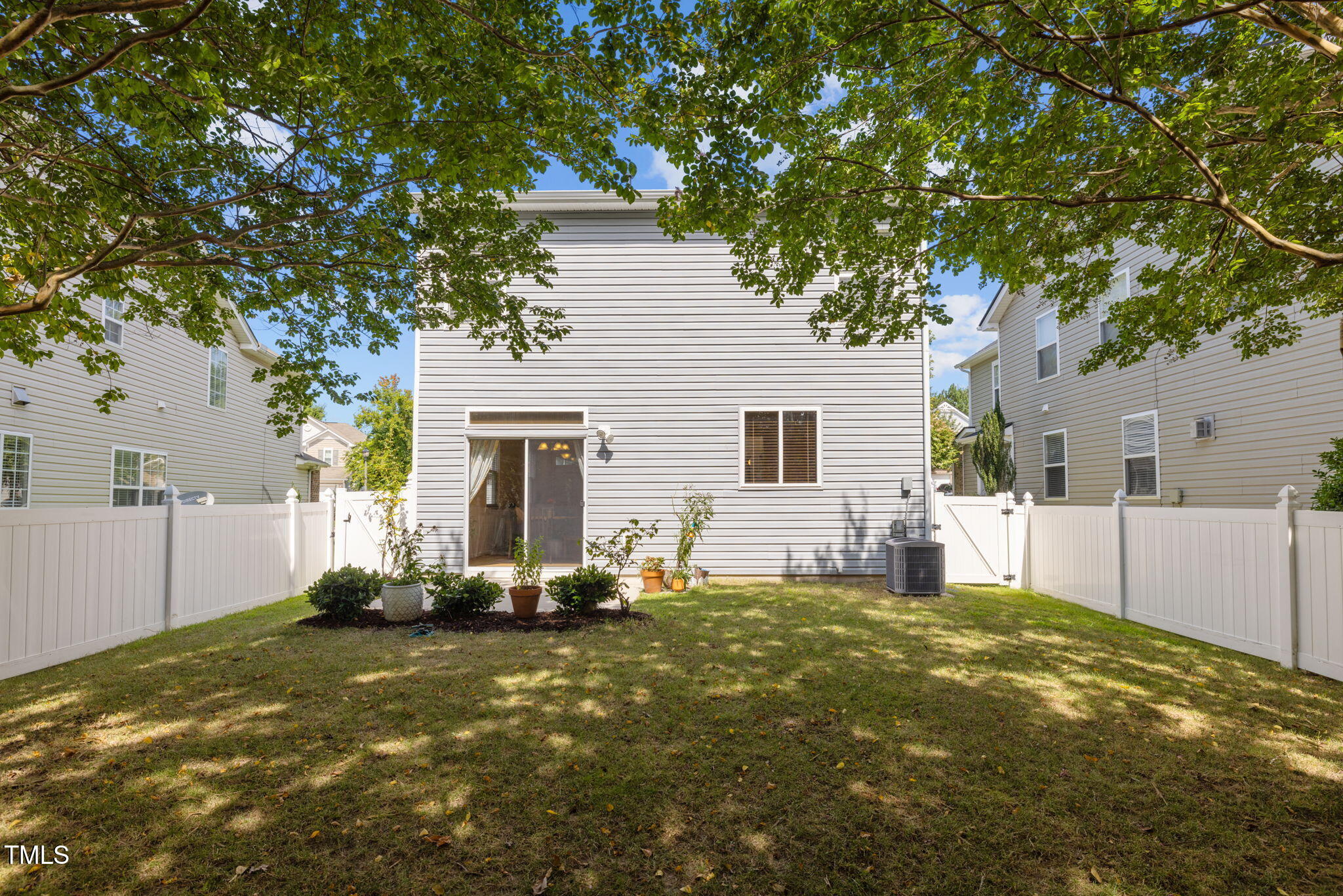 706 Delta Downs Drive Cary, NC 27519 - Photo 4 of 42 a view of a house with a patio