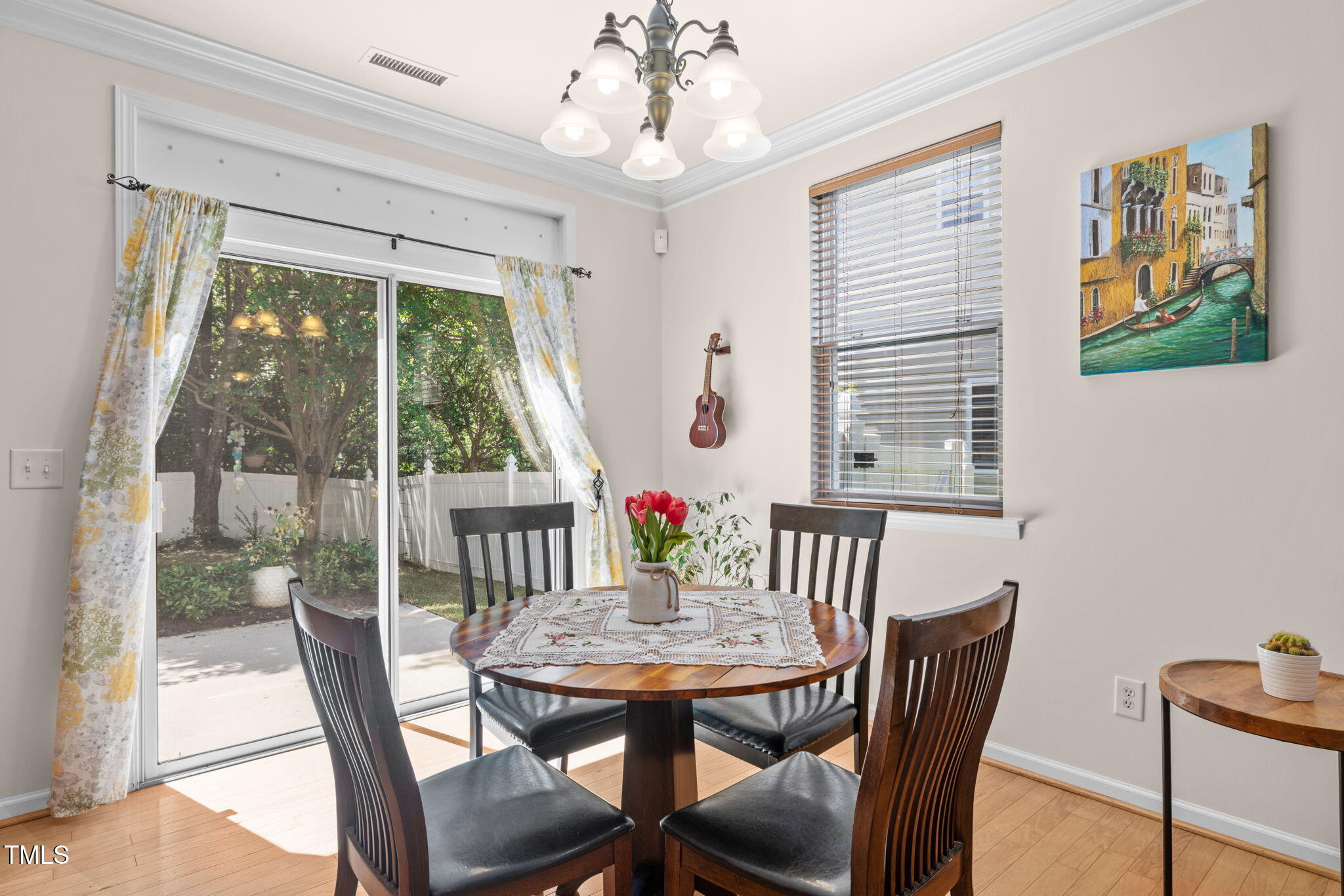 706 Delta Downs Drive Cary, NC 27519 - Photo 10 of 42 a view of a dining room with furniture window and outside view