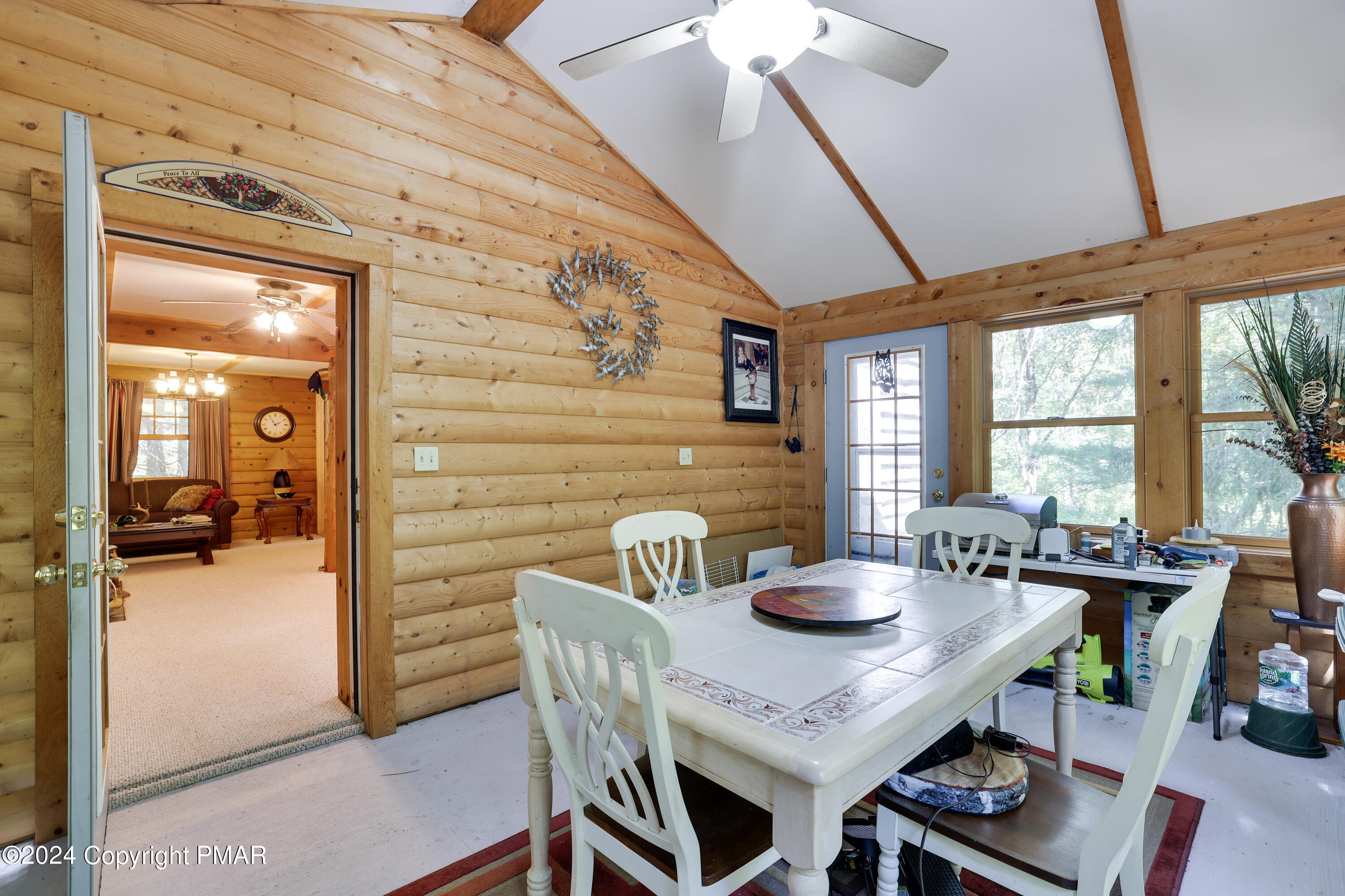 100 Ruffed Grouse Drive Shohola, PA 18458 - Photo 12 of 34 a dining room with furniture and window
