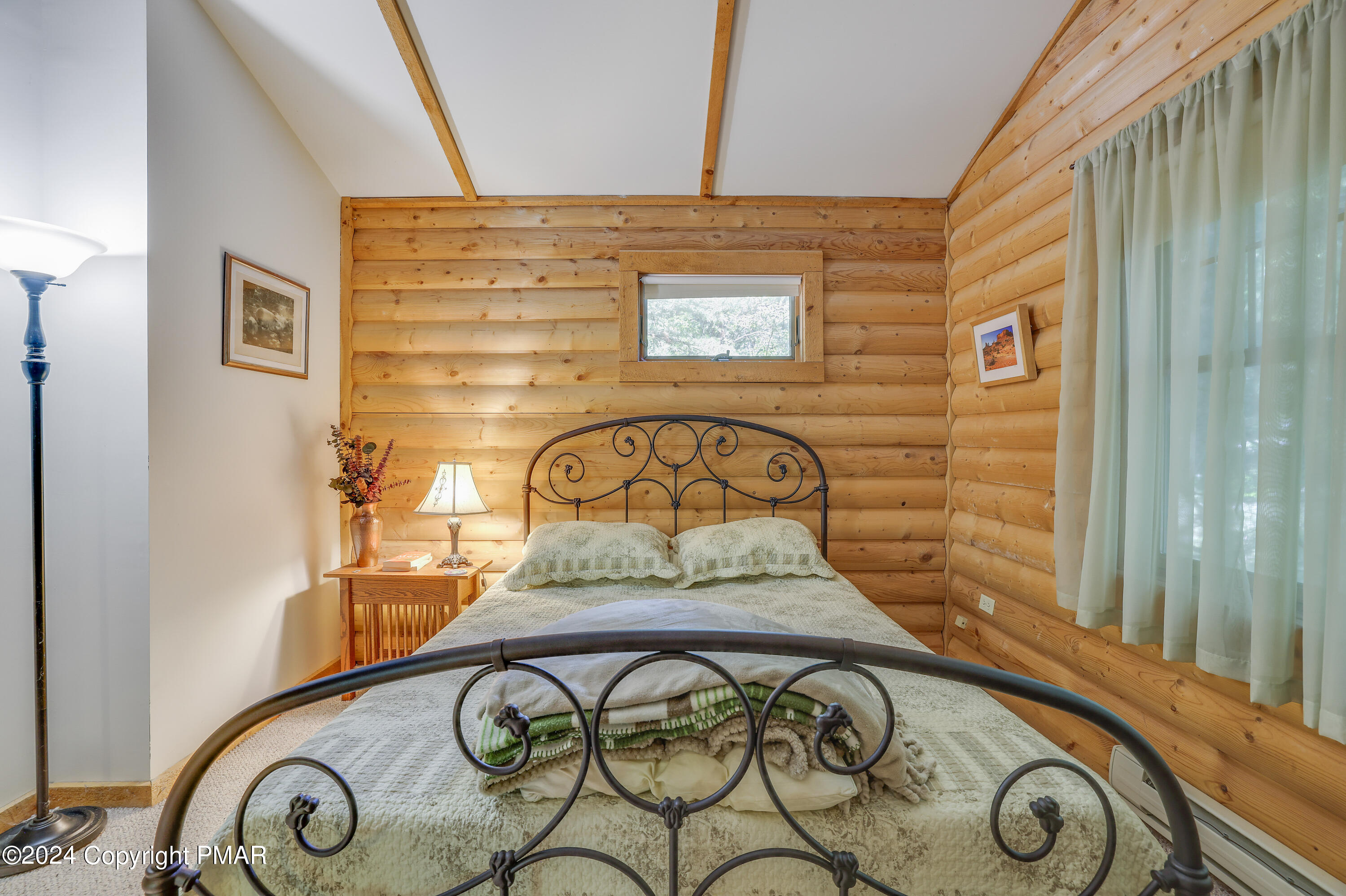100 Ruffed Grouse Drive Shohola, PA 18458 - Photo 21 of 34 a view of a door and chair in the balcony