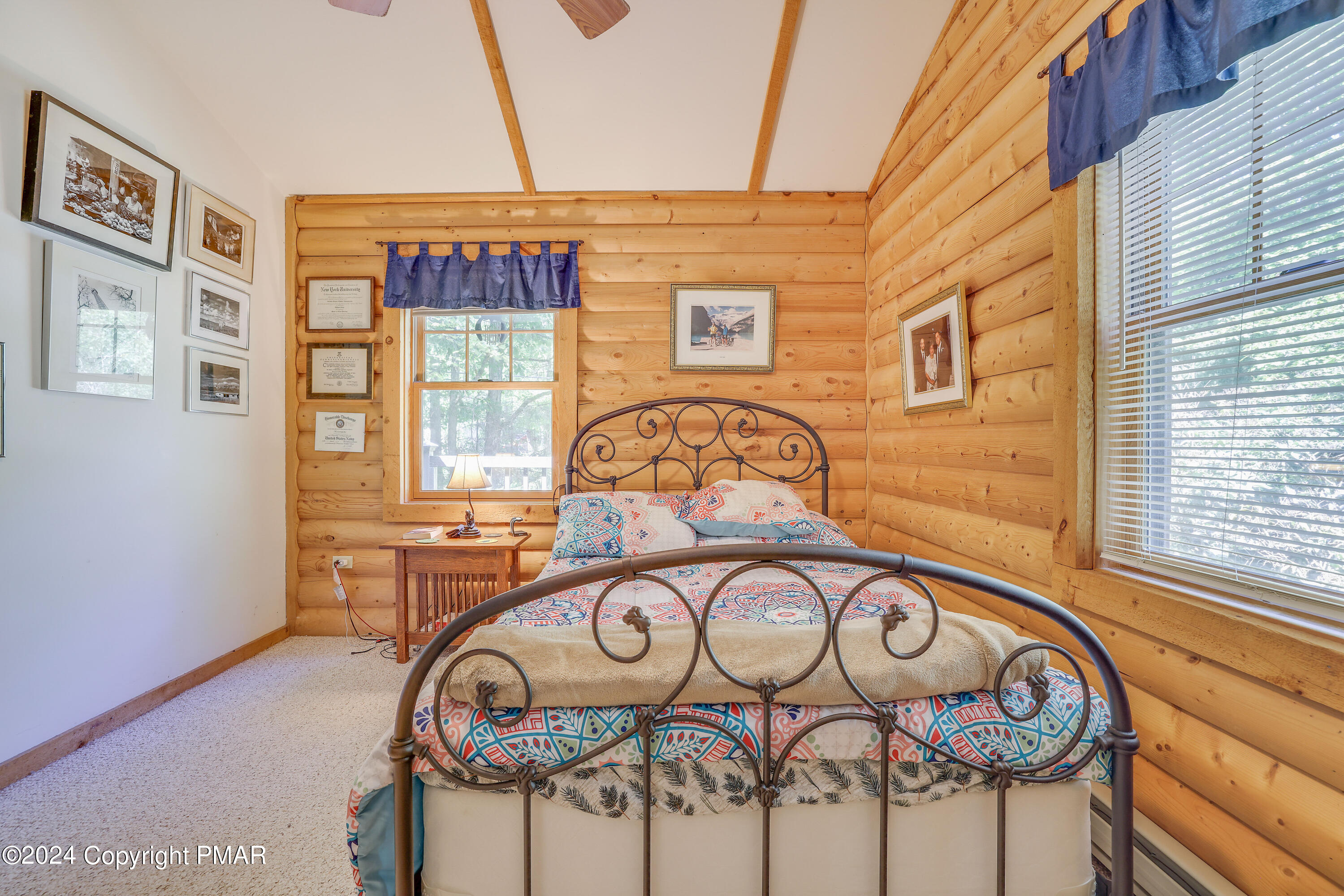 100 Ruffed Grouse Drive Shohola, PA 18458 - Photo 25 of 34 a front view of a house with large windows