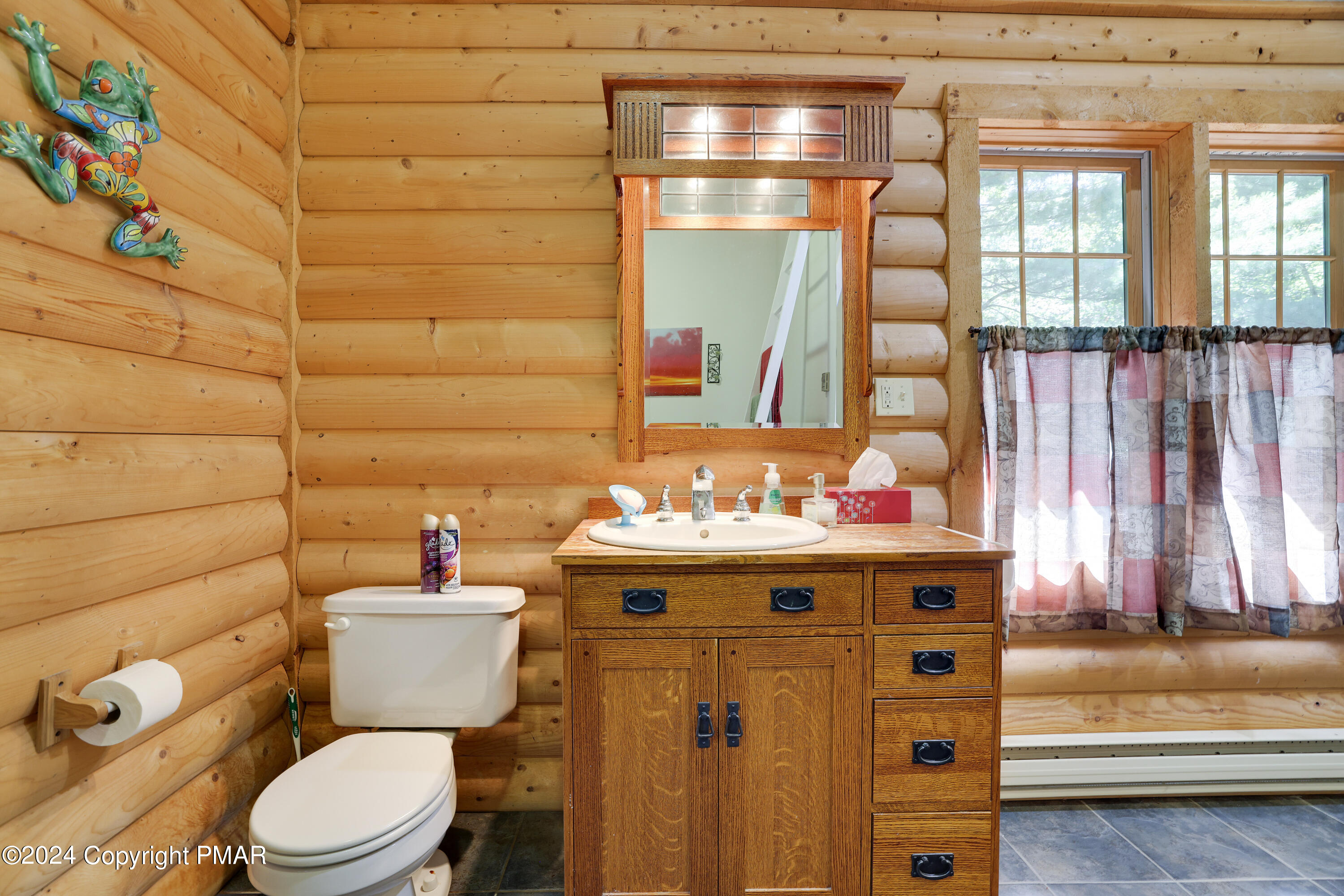100 Ruffed Grouse Drive Shohola, PA 18458 - Photo 28 of 34 a bathroom with a sink and a toilet