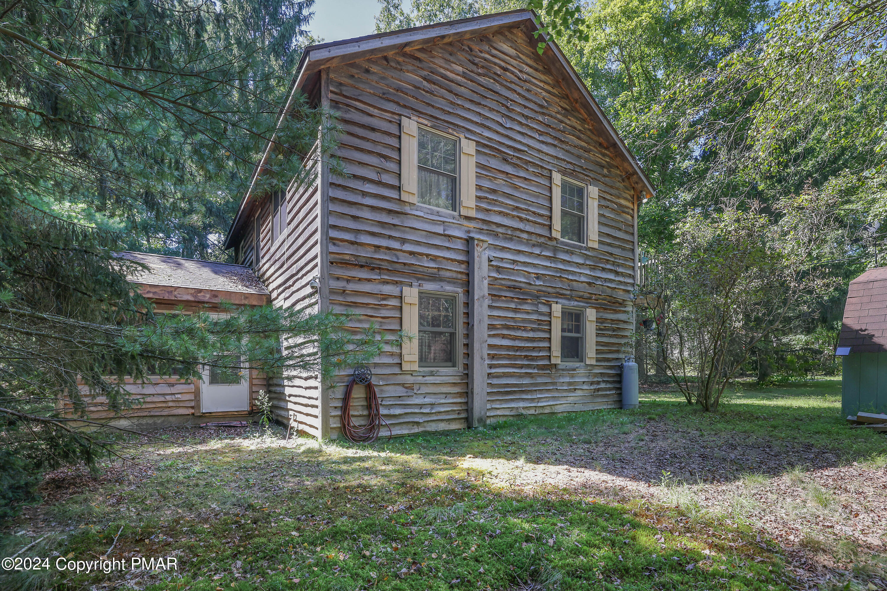 100 Ruffed Grouse Drive Shohola, PA 18458 - Photo 31 of 34 a view of a house with a yard
