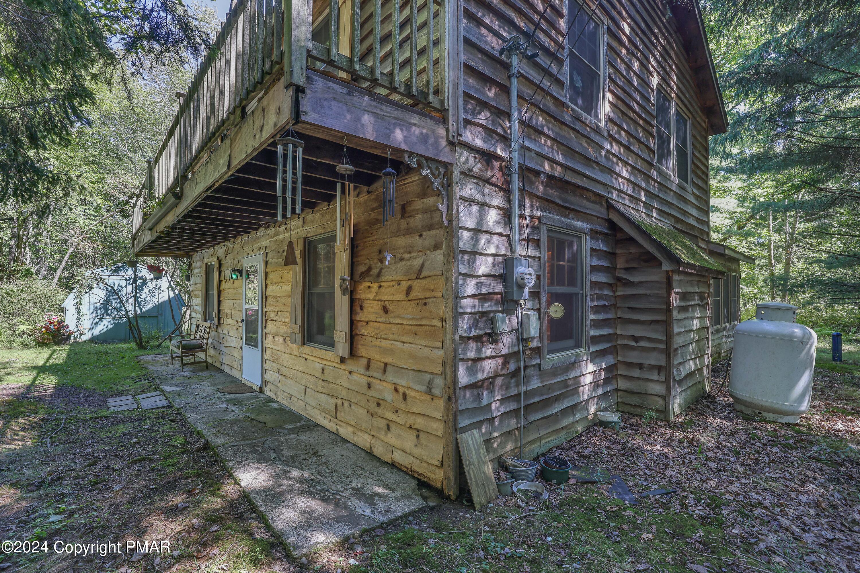 100 Ruffed Grouse Drive Shohola, PA 18458 - Photo 33 of 34 a view of a house with a yard