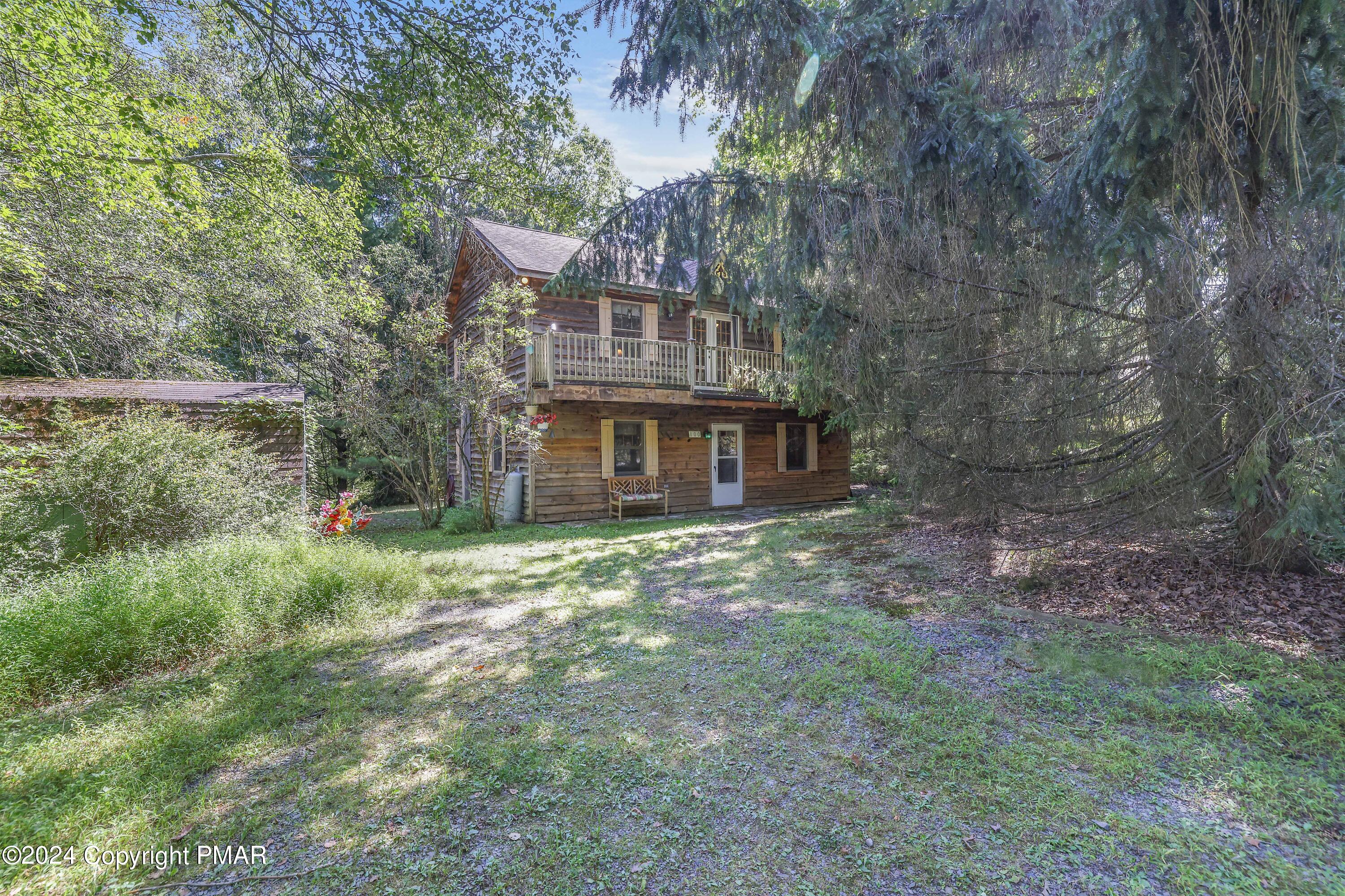 100 Ruffed Grouse Drive Shohola, PA 18458 - Photo 34 of 34 a view of a house with a yard