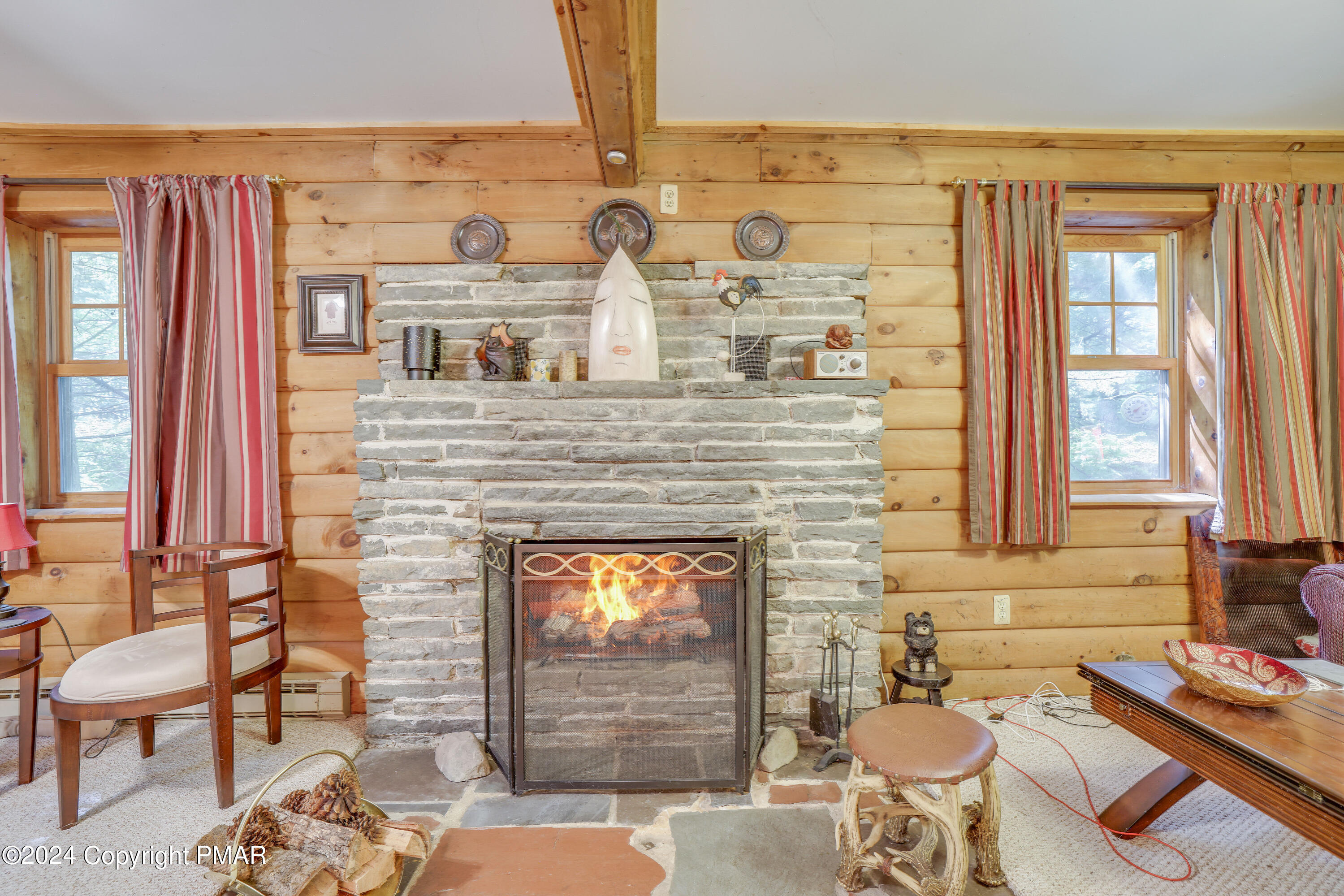 100 Ruffed Grouse Drive Shohola, PA 18458 - Photo 10 of 34 view of living room with furniture and a fireplace