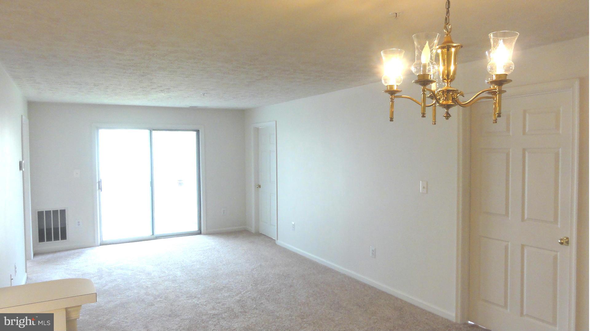 666 Kennington Road, Unit 666 Reisterstown, MD 21136 - Photo 2 of 10 View from the dining area of the living room