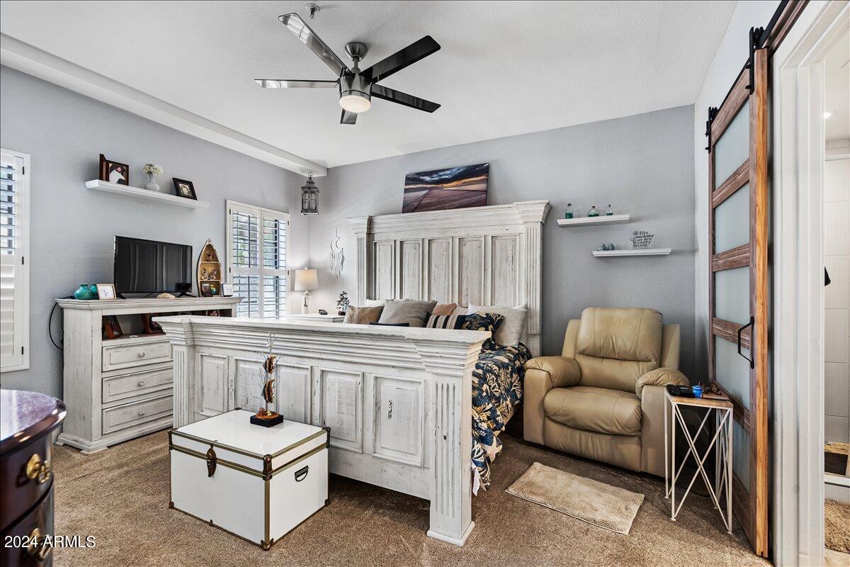 8300 East Vía De Ventura, Unit 1015 Scottsdale, AZ 85258 - Photo 19 of 26 a living room with furniture and flat screen tv