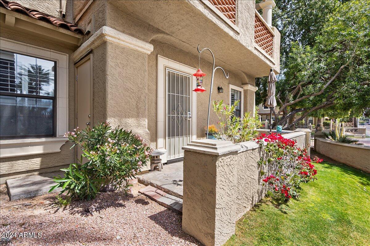 8300 East Vía De Ventura, Unit 1015 Scottsdale, AZ 85258 - Photo 24 of 26 a house view with a outdoor space