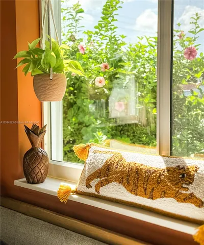 a view of a living room and bathroom