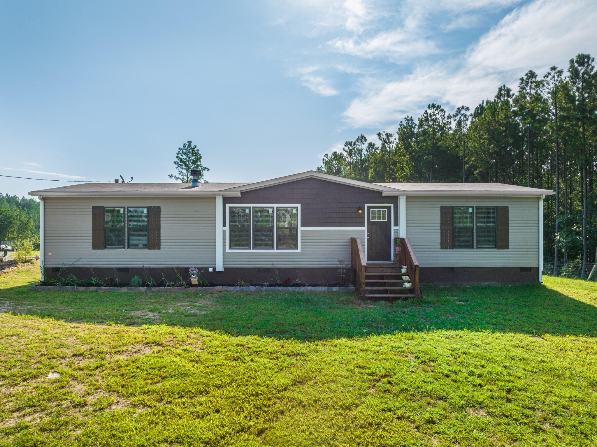 450 Cottonport Ridge Road Decatur, TN 37322 - Photo 1 of 51 a view of a house with a backyard and a patio