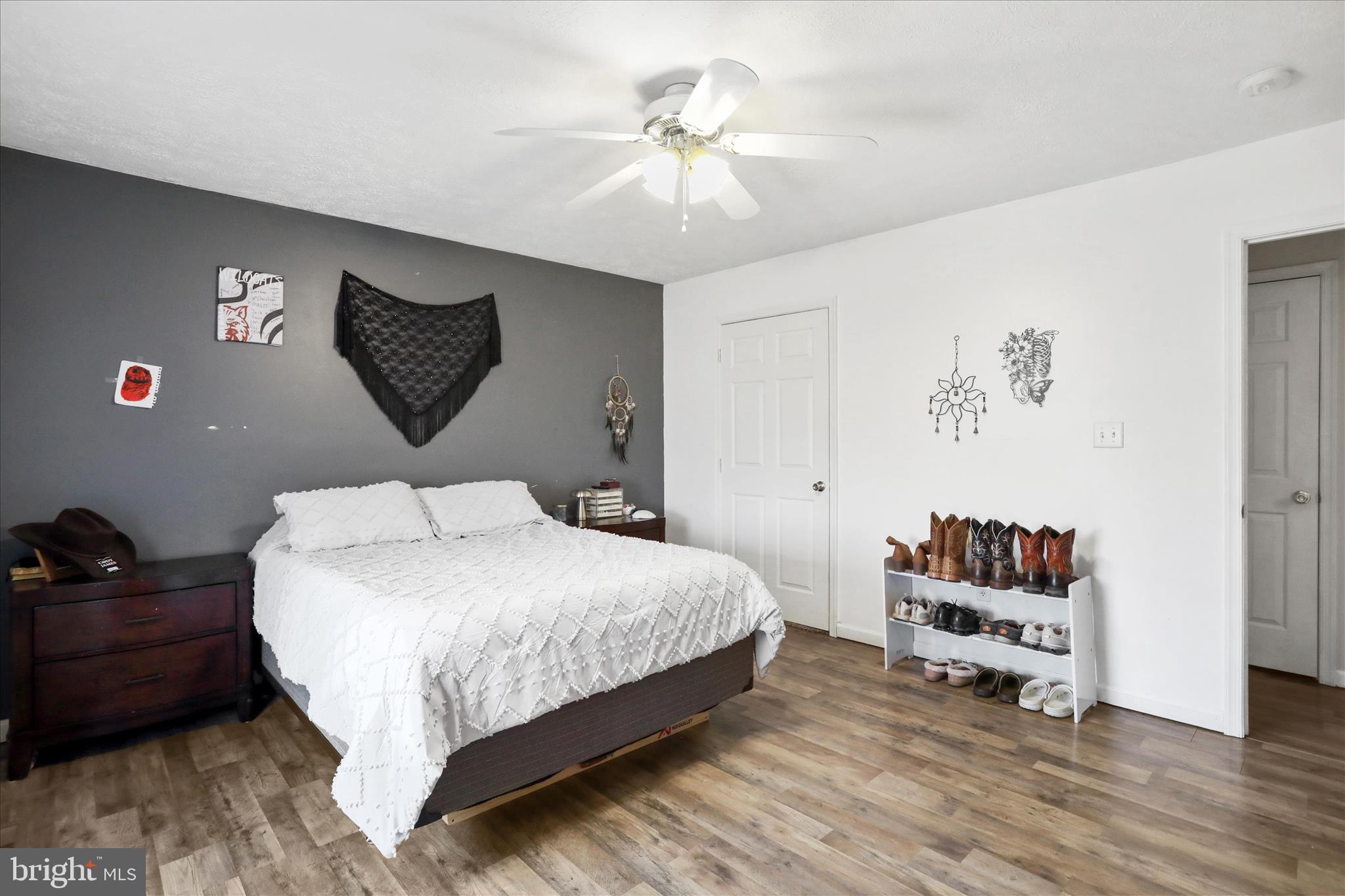 40 Lookout Point Way Linden, VA 22642 - Photo 16 of 36 a bedroom with a bed and a chandelier