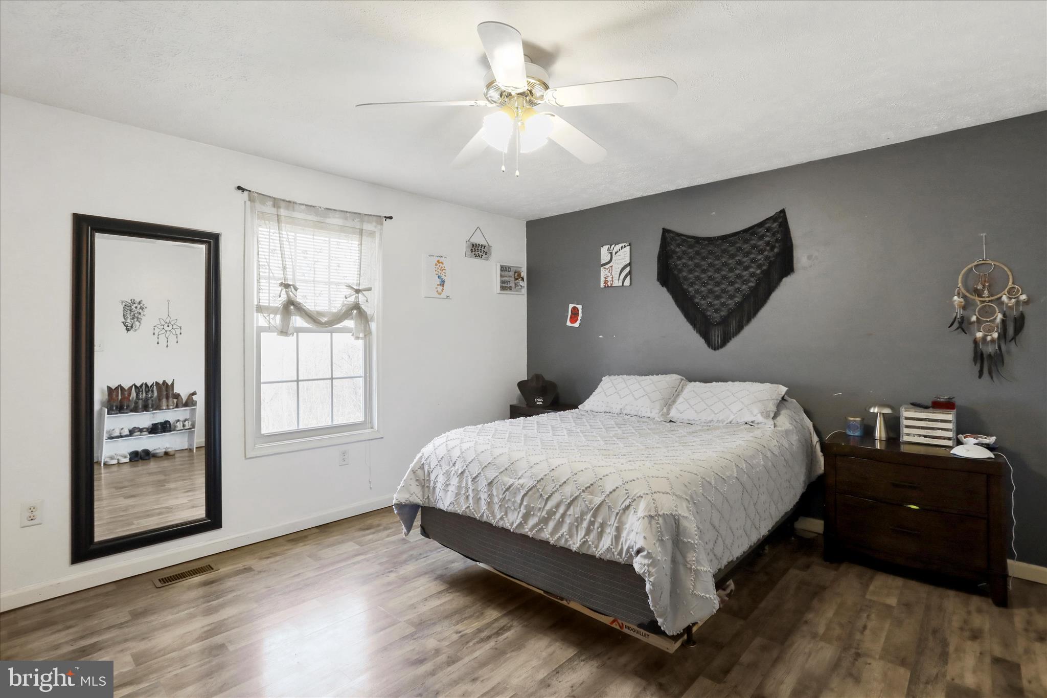 40 Lookout Point Way Linden, VA 22642 - Photo 17 of 36 a bedroom with a bed and a window