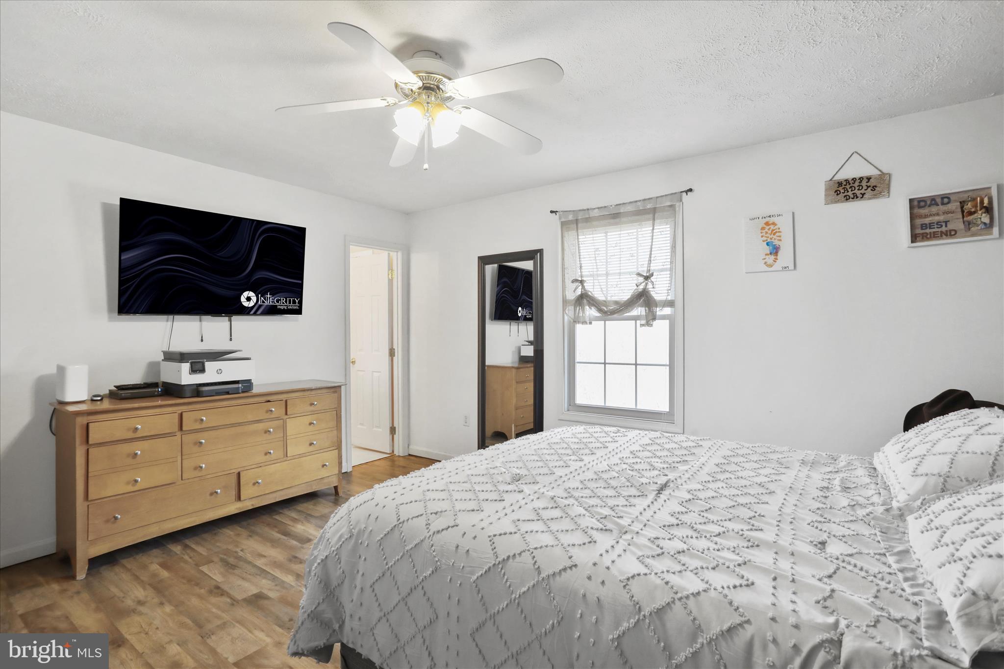 40 Lookout Point Way Linden, VA 22642 - Photo 18 of 36 a bedroom with a large bed and a flat screen tv