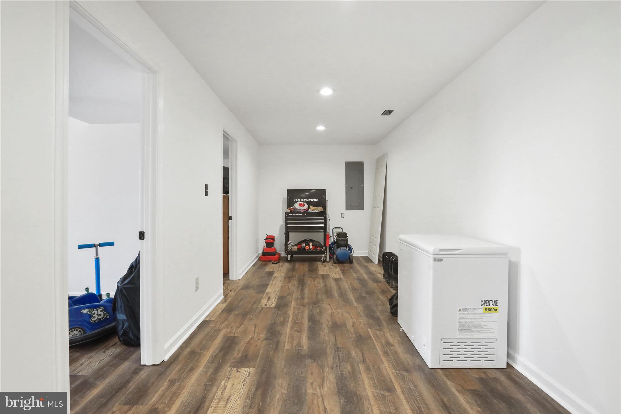 40 Lookout Point Way Linden, VA 22642 - Photo 29 of 36 a view of a hallway with wooden floor and furniture