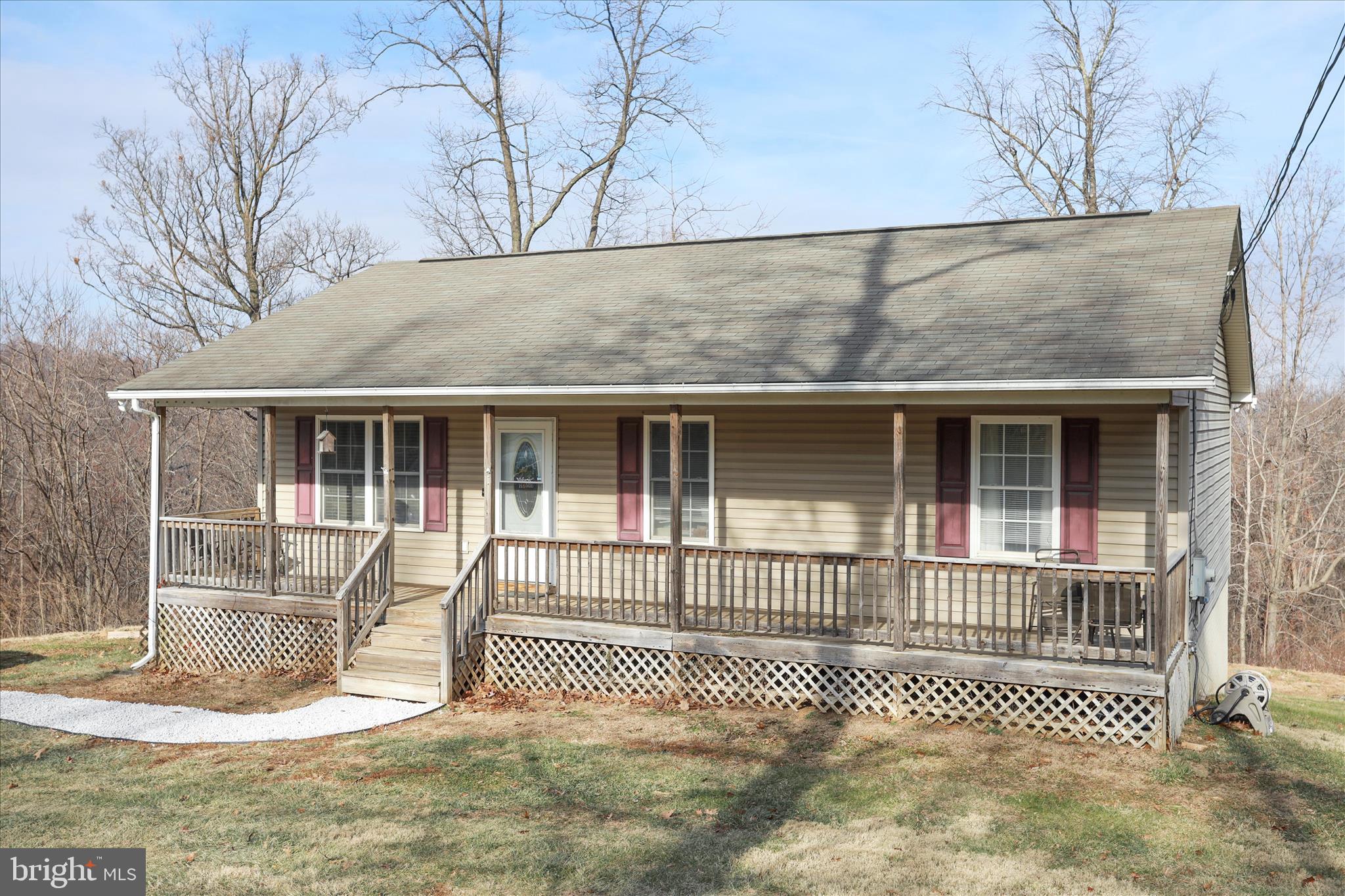 40 Lookout Point Way Linden, VA 22642 - Photo 3 of 36 a front view of a house with a fence
