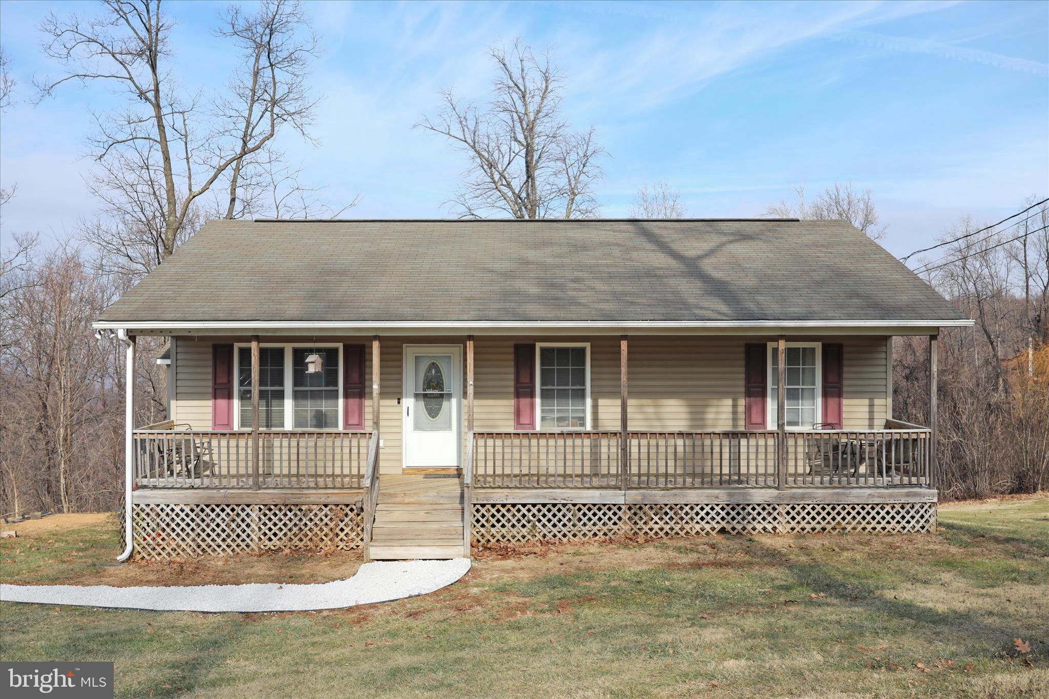 40 Lookout Point Way Linden, VA 22642 - Photo 4 of 36 a front view of a house with a garden