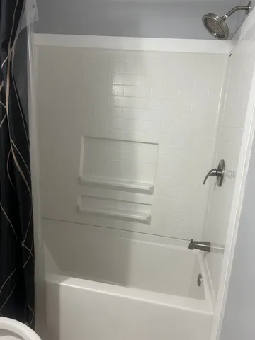 a bathroom with a bathtub