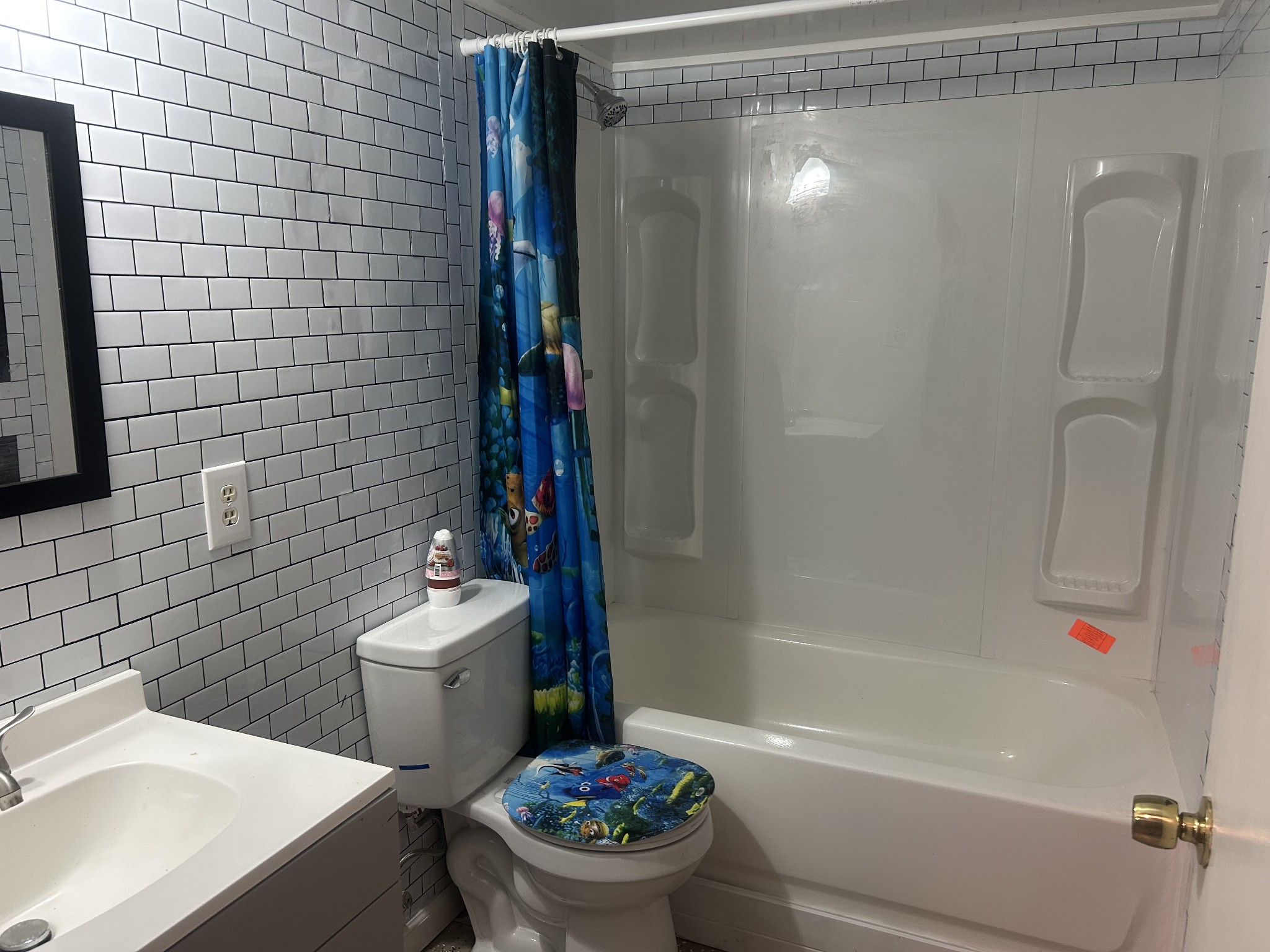 370 Alpine Road Camden, TN 38320 - Photo 15 of 20 a bathroom with a sink toilet and shower