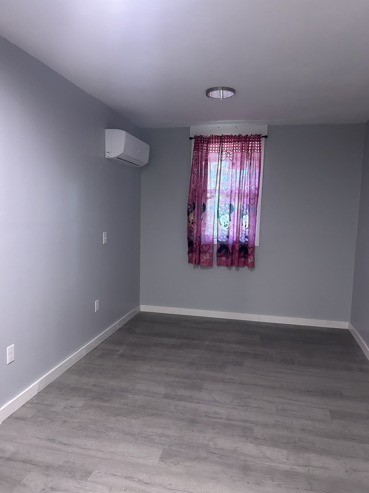 370 Alpine Road Camden, TN 38320 - Photo 17 of 20 an empty room with wooden floor and windows