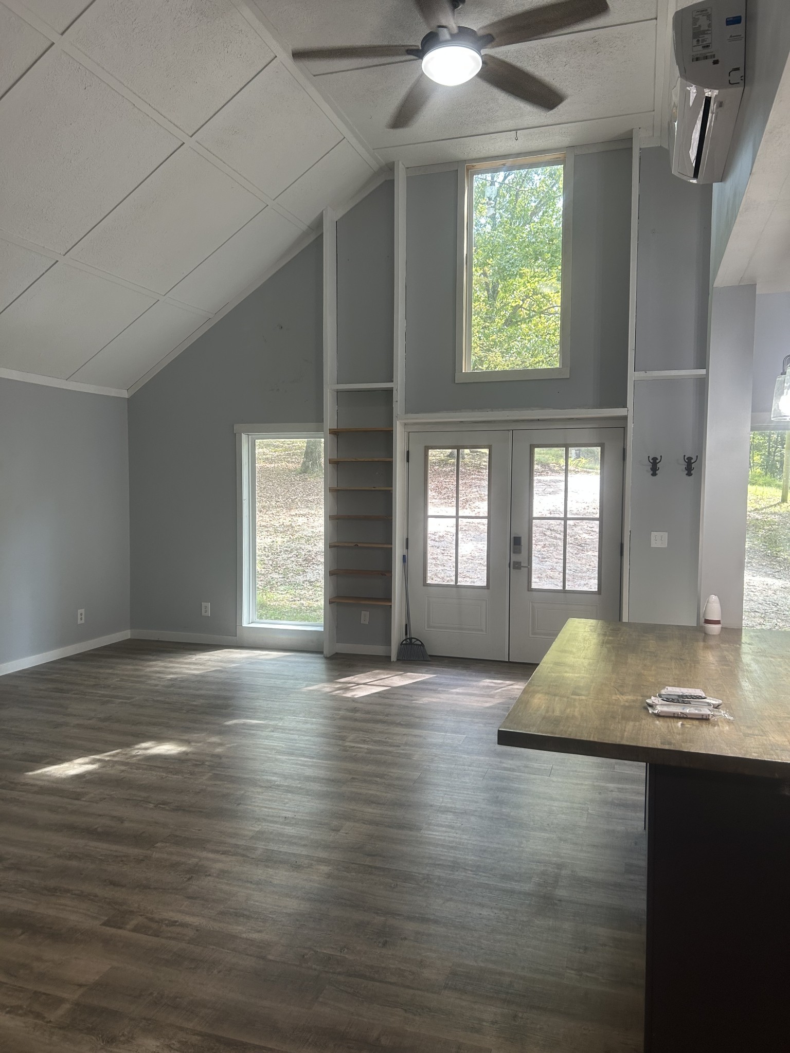 370 Alpine Road Camden, TN 38320 - Photo 6 of 20 a view of an empty room with window and wooden floor