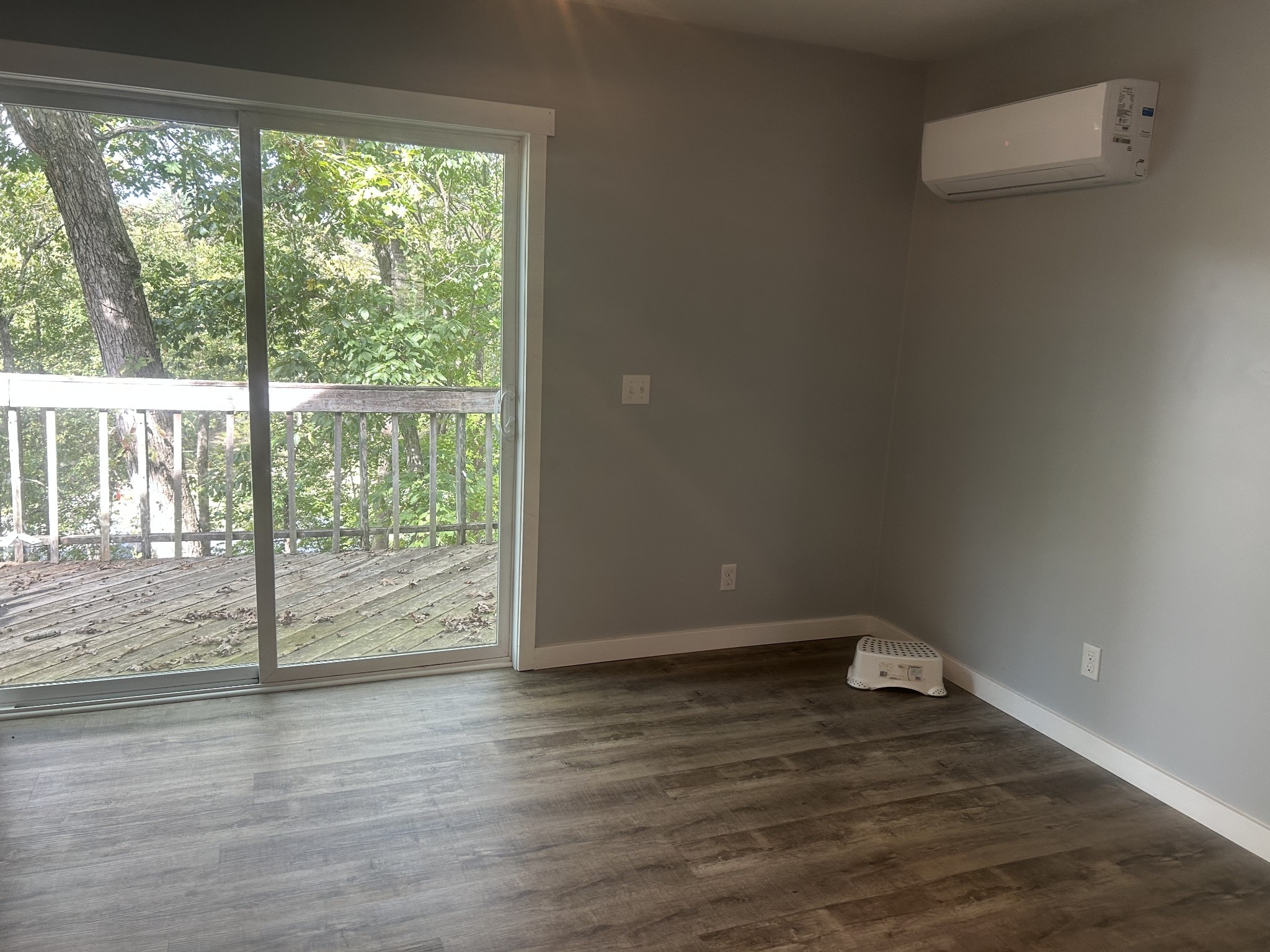 370 Alpine Road Camden, TN 38320 - Photo 9 of 20 a view of empty room with wooden floor and fan