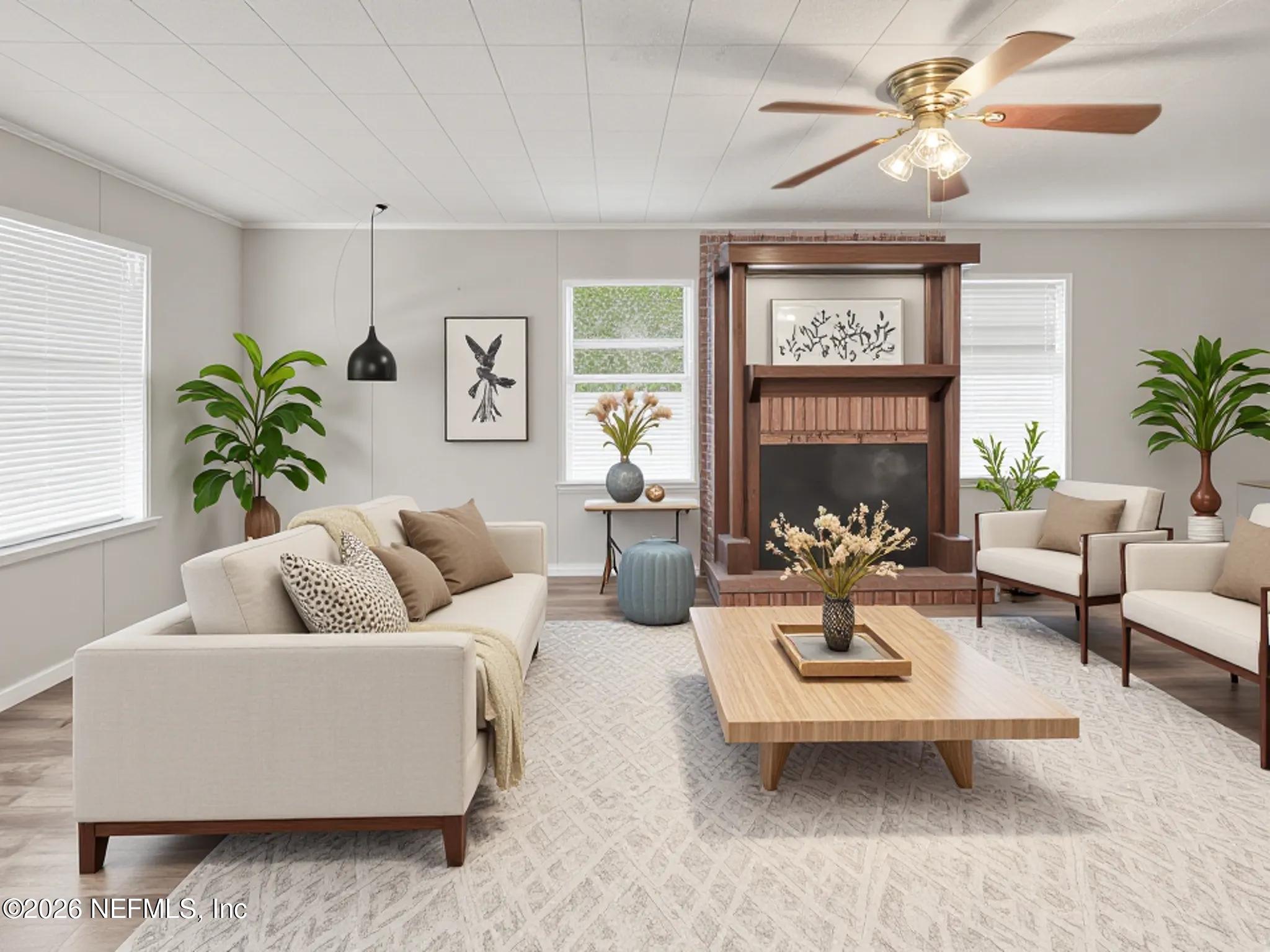 326 Cahoon Road South Jacksonville, FL 32220 - Photo 5 of 34 a living room with furniture and a large window