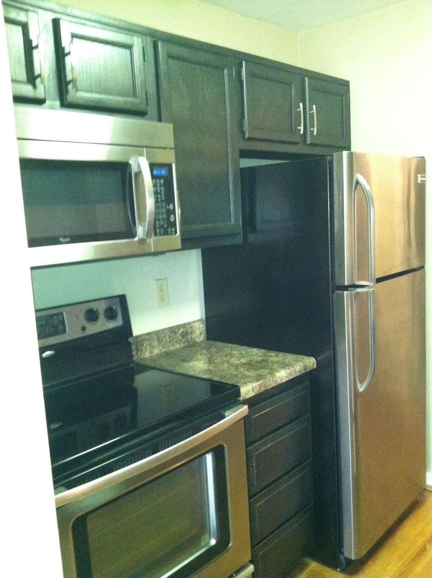 3273 Forest Ridge Road Roanoke, VA 24018 - Photo 3 of 5 a kitchen with a sink and a refrigerator