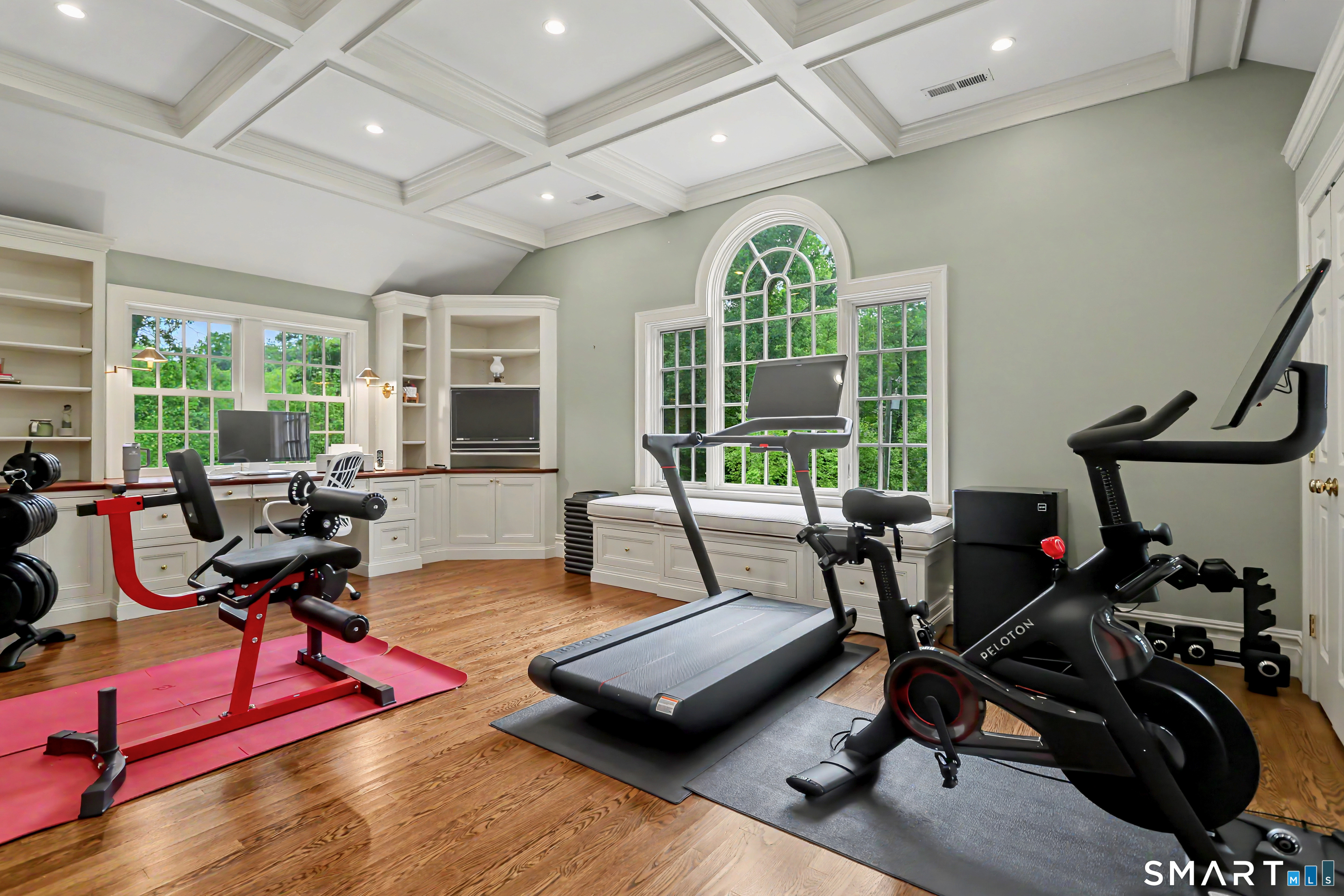 108 Logan Road New Canaan, CT 06840 - Photo 31 of 40 a view of a livingroom with workspace and a window
