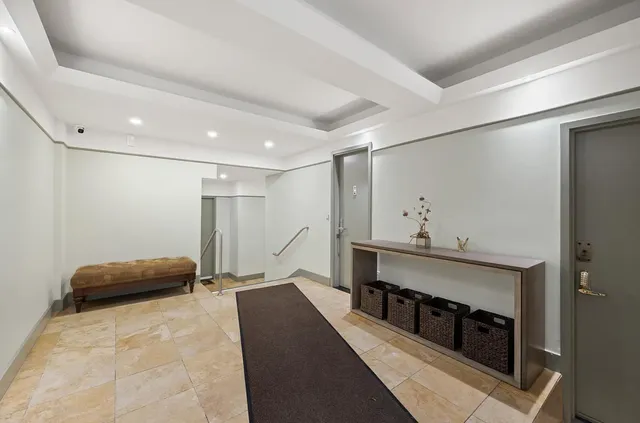 a stove top oven sitting inside of a kitchen