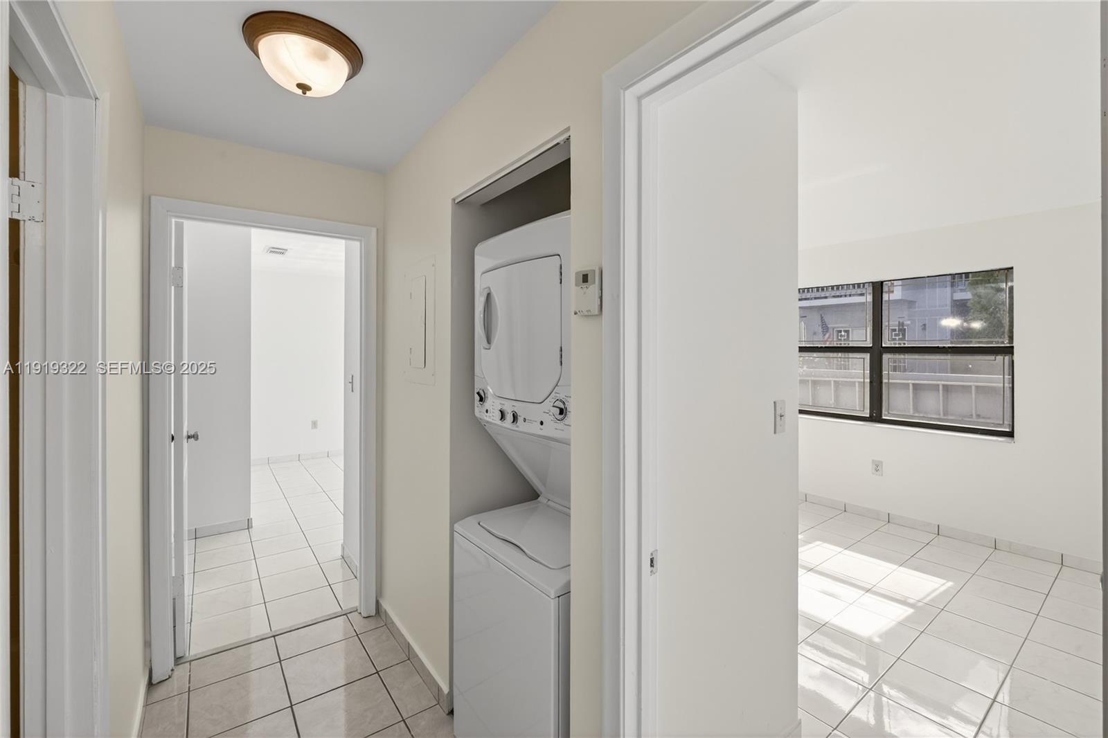 13675 Southwest 62nd Street, Unit 1023 Miami, FL 33183 - Photo 11 of 29 a bathroom with a tub and shower