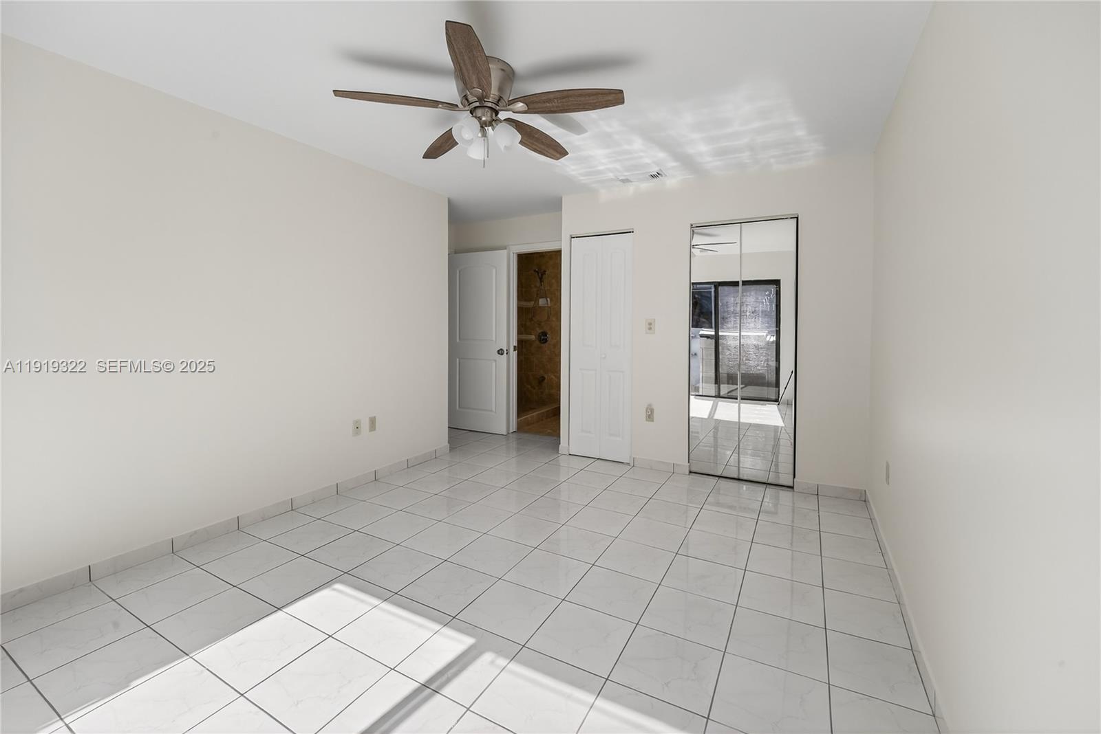 13675 Southwest 62nd Street, Unit 1023 Miami, FL 33183 - Photo 18 of 29 a view of an empty room