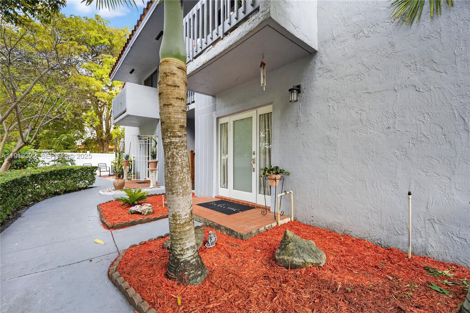 13675 Southwest 62nd Street, Unit 1023 Miami, FL 33183 - Photo 3 of 29 a outdoor space with furniture