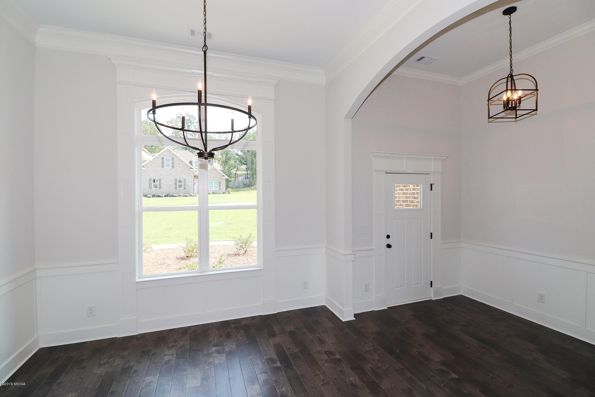109 Timber Ridge Circle Byron, GA 31008 - Photo 4 of 45 a view of a room with window wooden floor and chandelier