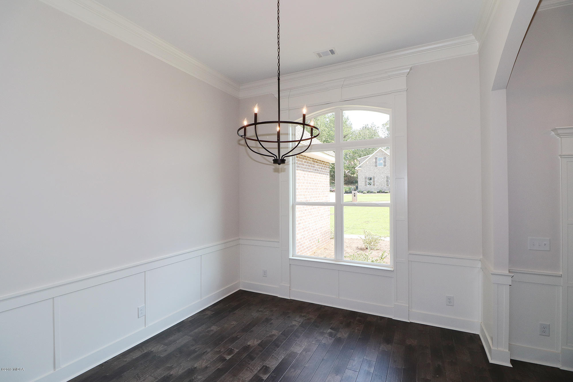 109 Timber Ridge Circle Byron, GA 31008 - Photo 5 of 45 a view of a room with window wooden floor and chandelier
