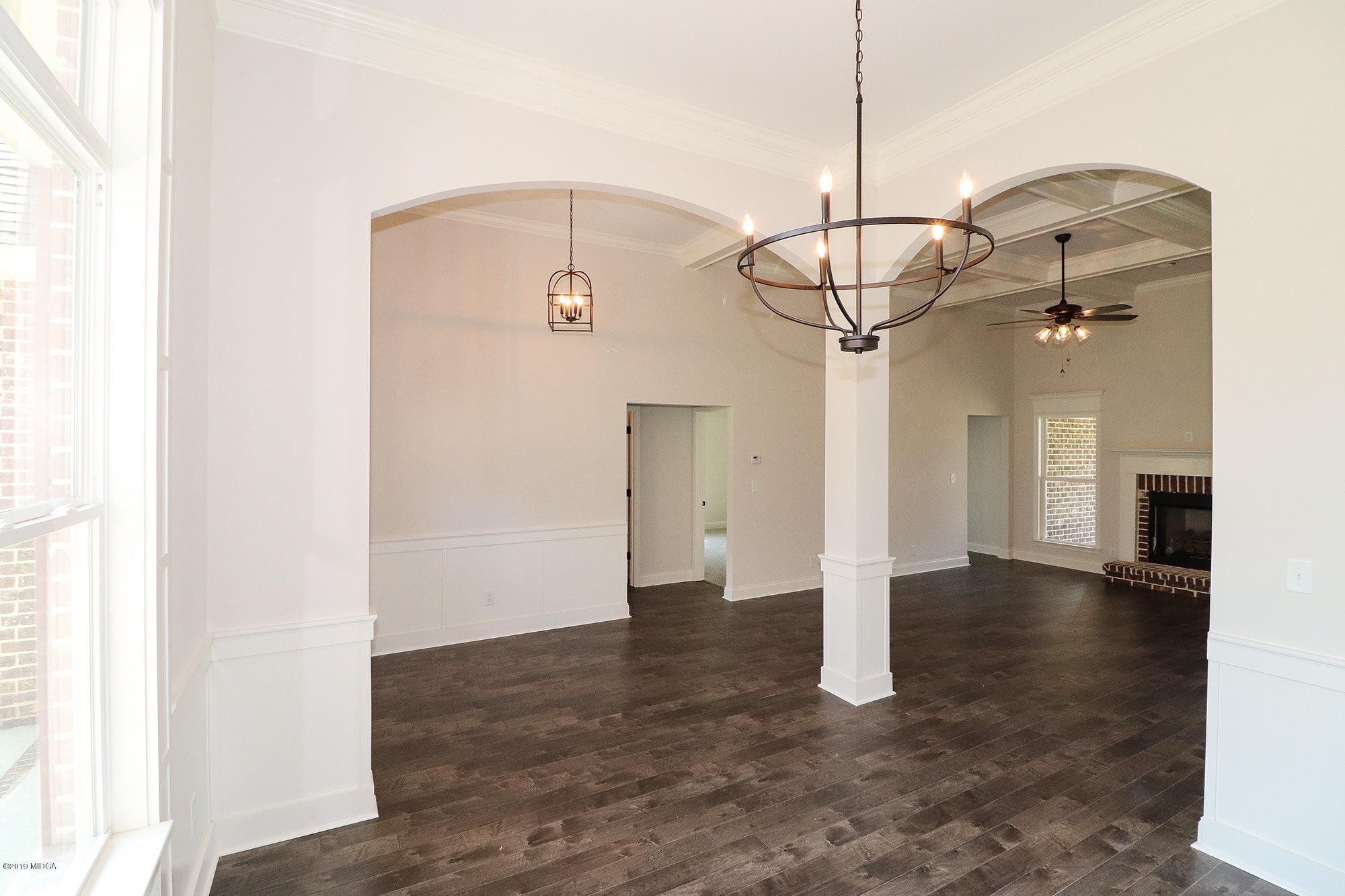 109 Timber Ridge Circle Byron, GA 31008 - Photo 8 of 45 a view of a hallway with a chandelier