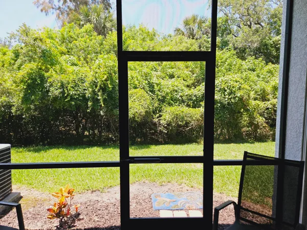 a bedroom with a bed and flat screen tv