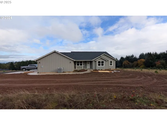 a house view with a garden space