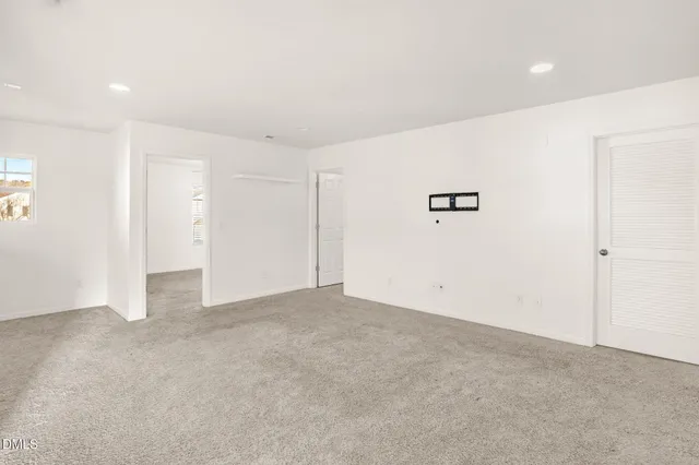 a view of a livingroom with a flat screen tv