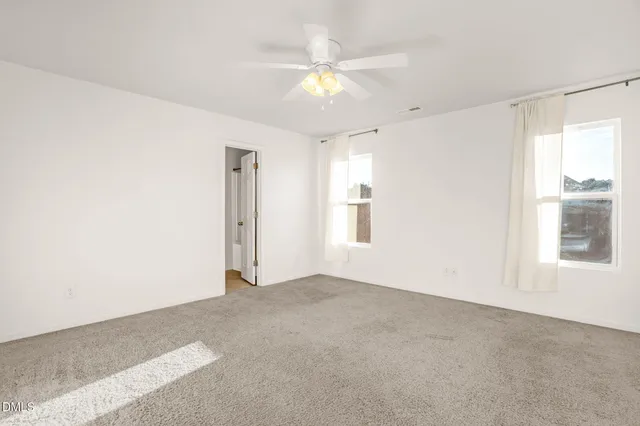 a bathroom with a sink mirror toilet and bathtub