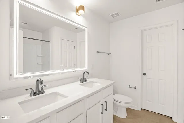 a view of a lake with houses