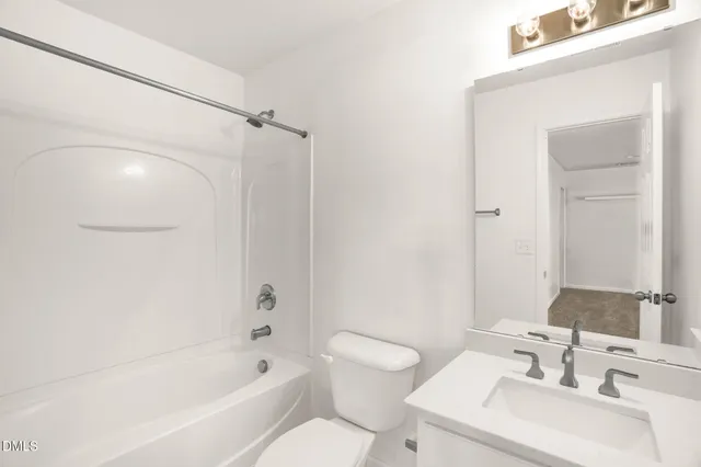 a front view of a house with a garage