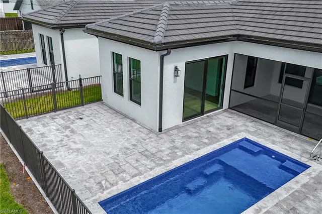 a view of a backyard with a tub