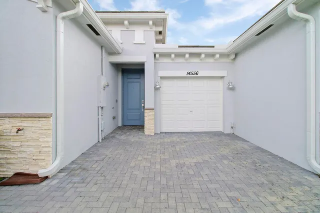 a view of a utility room with closet
