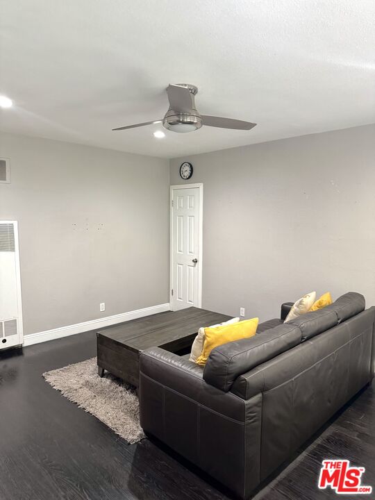 50 Elm Avenue, Unit 5 Long Beach, CA 90802 - Photo 16 of 44 a living room with furniture and a chandelier